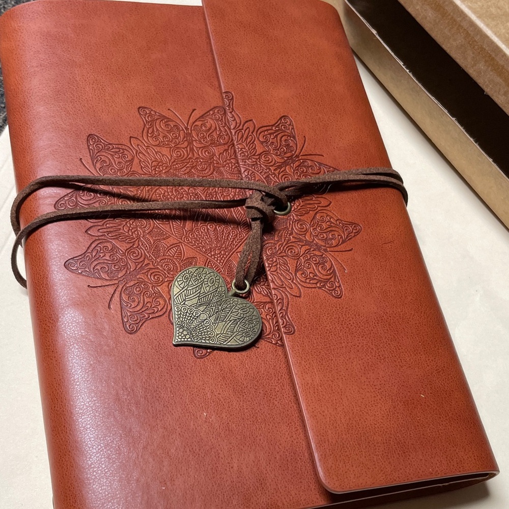 Embossed Journal w/leather & heart closure